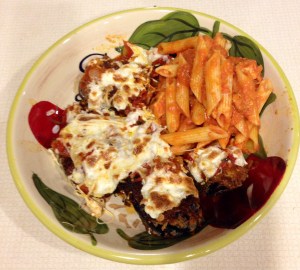Eggplant parm, served with a little leftover penne-from-the-barbecue-place. Hey, at least dinner did not consist solely of Monkey Bread.