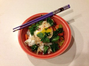 In slightly more than the time it takes to fry an egg, a few scruffy vegetables and some leftover rice can become this.