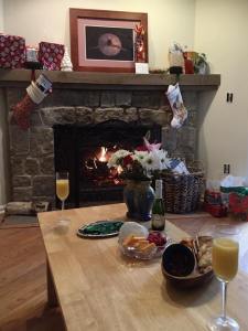 A tiny tree, some cheese and crackers, a snickerdoodle, and a mimosa by the fireside: maybe the most perfect Christmas luncheon ever.