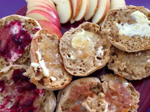 Pre-Catastrophe Breakfast. Since it's an English novel we're reading. English Muffins stood in for crumpets, toasted and spread with preserves, honey, and applesauce, with sliced apple alongside.